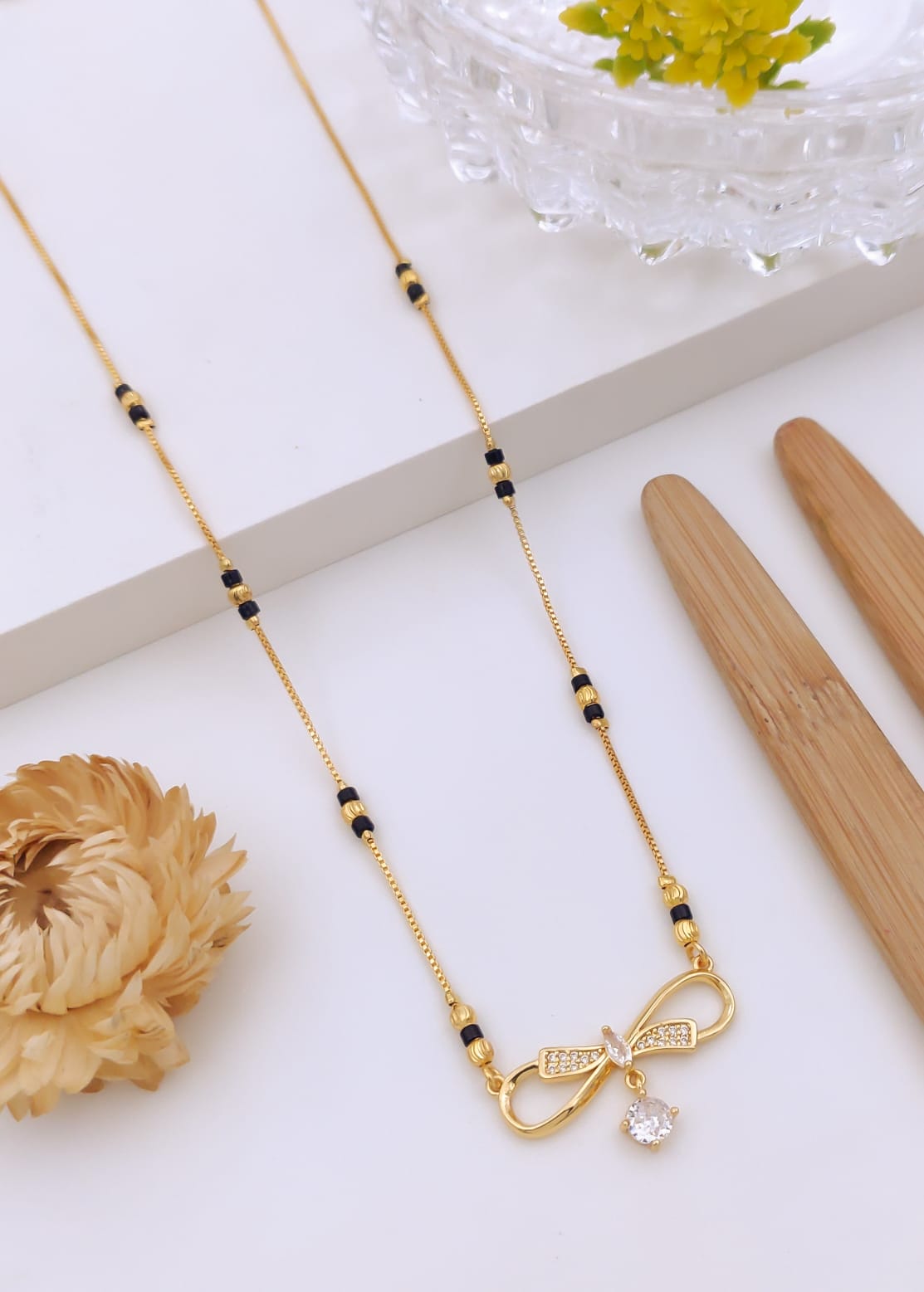 Elegant Ribbon Bow CZ Gold Mangalsutra with Solitaire Dangle