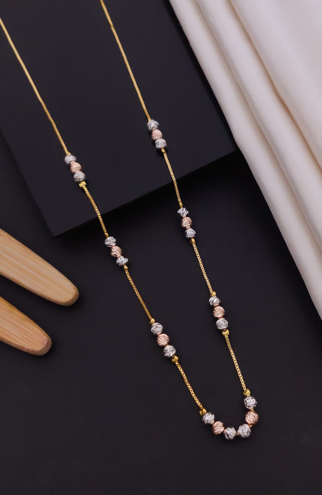 Elegant Tri-Tone Laser-Cut Sphere Station Gold Mangalsutra