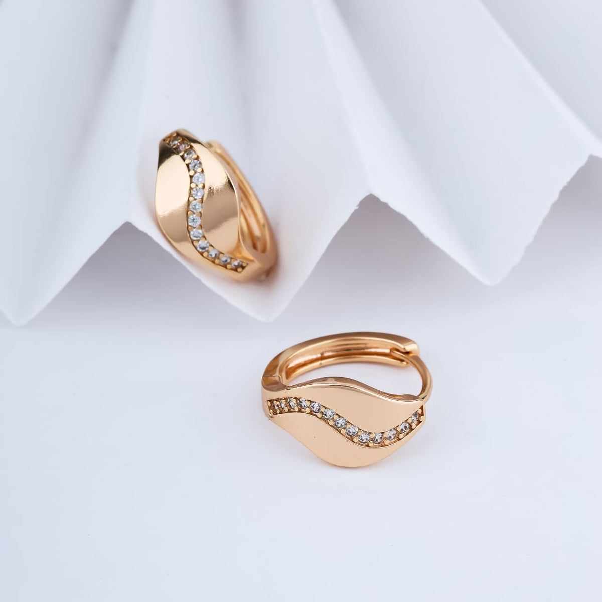 Gold-Plated Curved Wave Cubic Zirconia Huggie Hoop Earrings