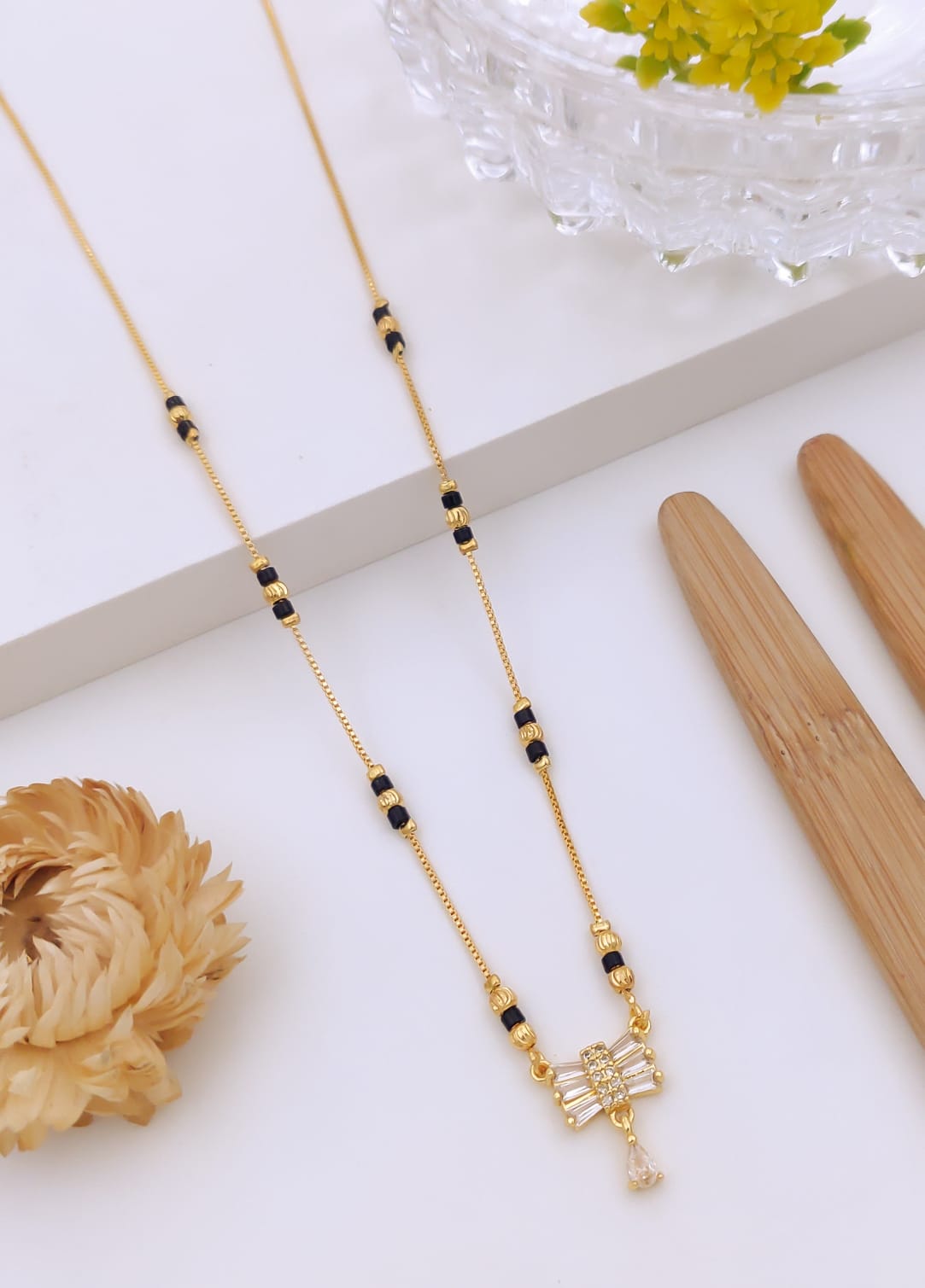 Elegant Baguette Bow CZ Gold Mangalsutra with Teardrop Dangle