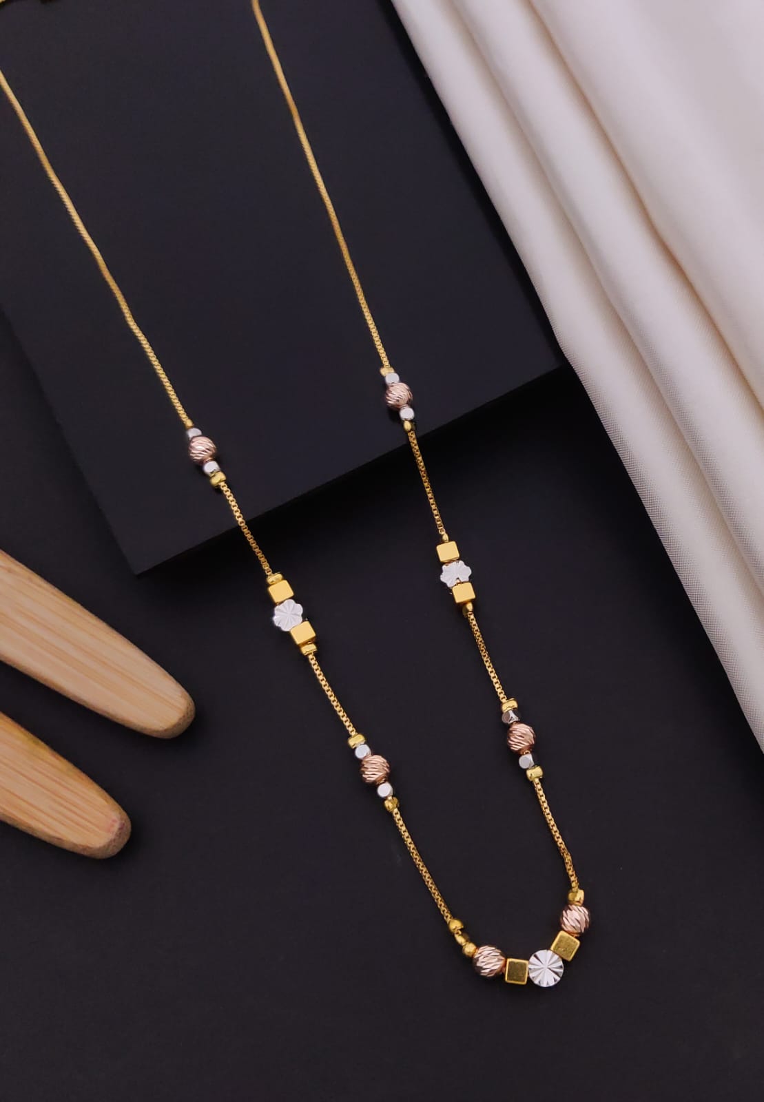 Elegant Tri-Tone Floral & Geometric Station Gold Mangalsutra