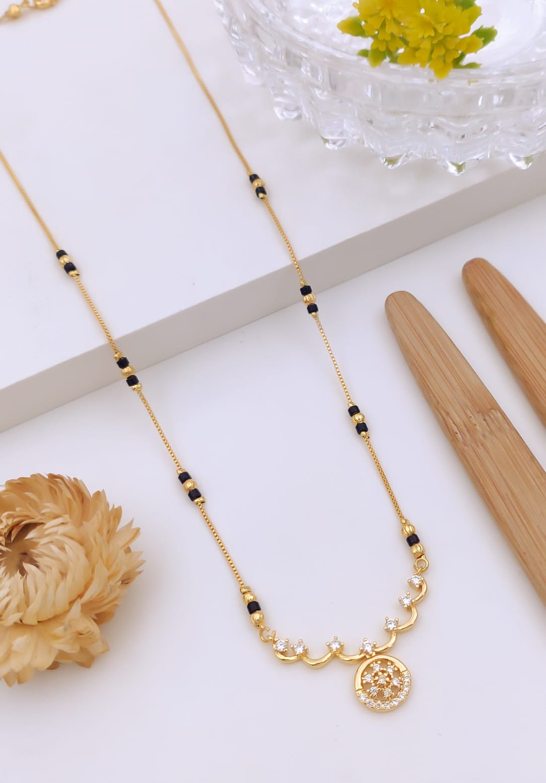 Elegant Wavy CZ Gold Mangalsutra with Circular Medallion