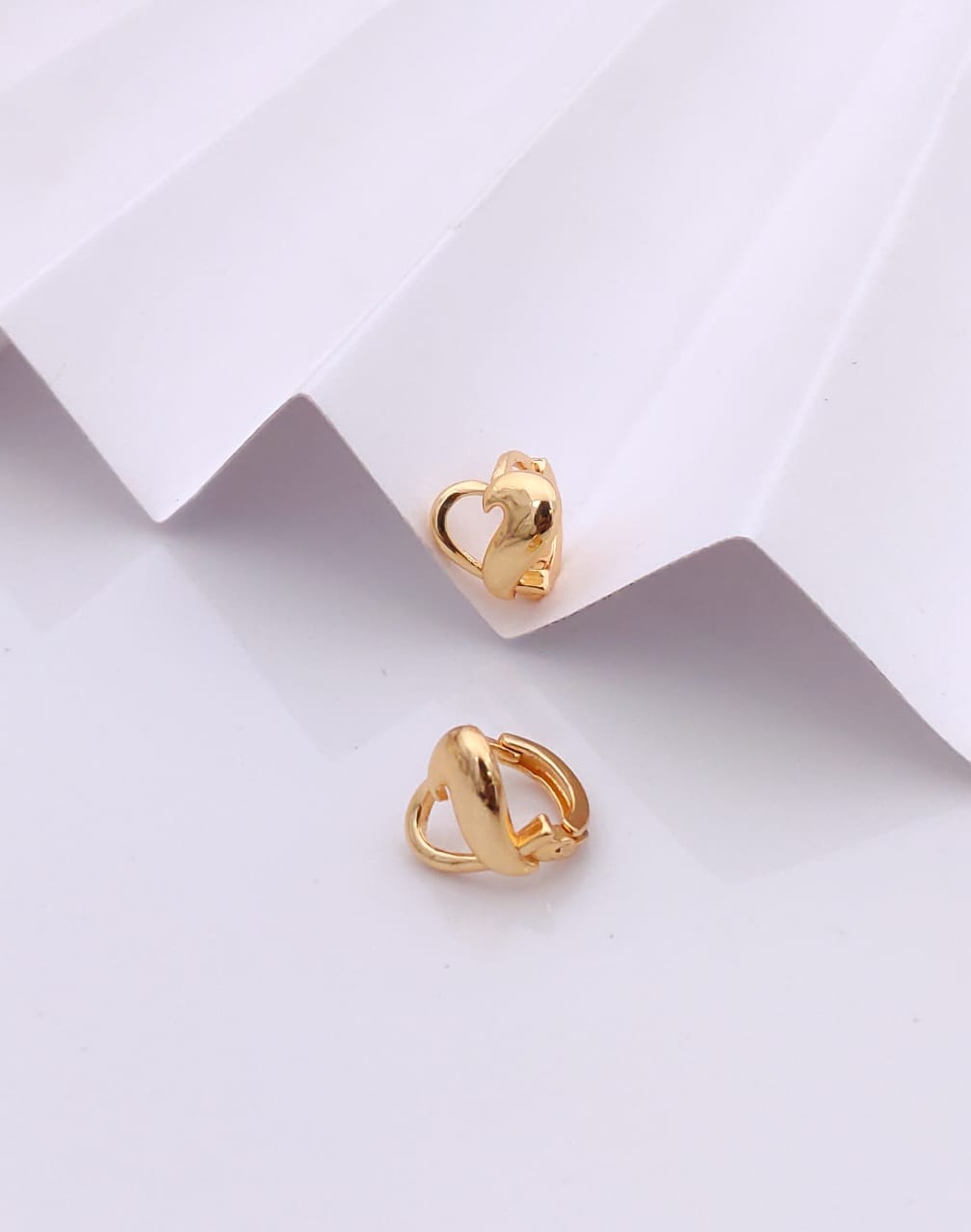 Charming Gold-Tone Polished Heart Huggie Hoop Earrings