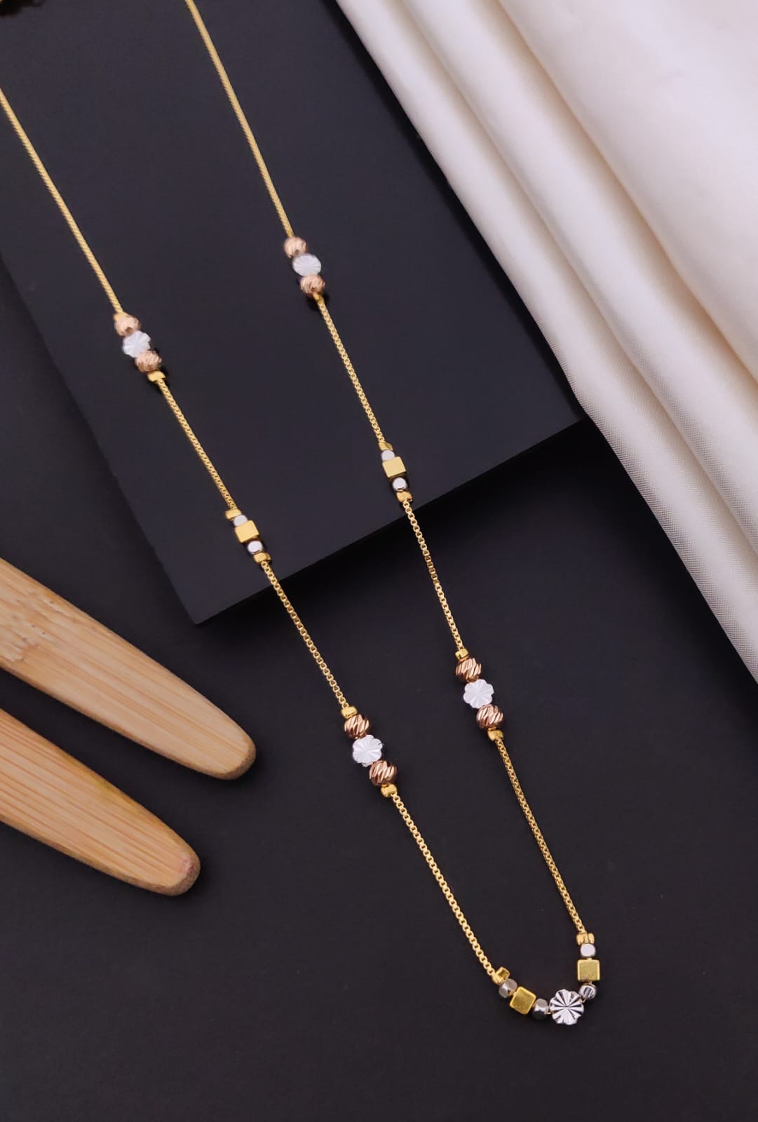 Elegant Tri-Tone Floral & Sphere Station Gold Mangalsutra